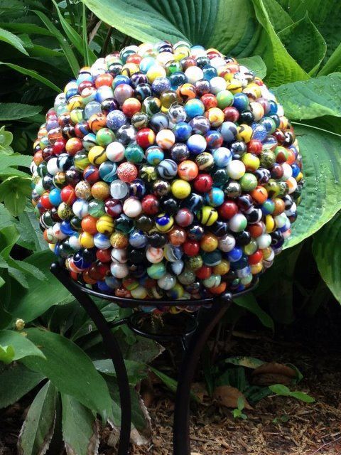 Bowling ball + 714 marbles = unique garden art