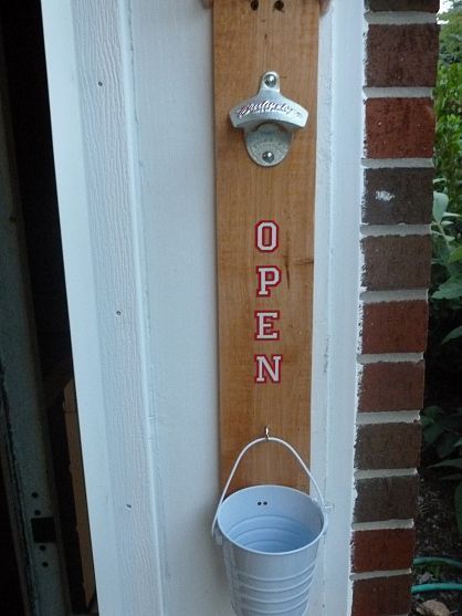 DIY Bottle opener – love the little bucket for catching the caps. we have bbqs w