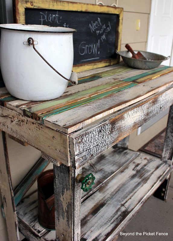 DIY Pallet potting bench.  We built one similar and added a sink and a 'bin&