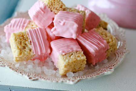 Half dipped rice krispies treats… such a simple and lovely idea for a party tr