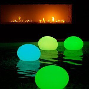 Homemade pool lanterns: Stick a glow stick in a balloon and blow it up.