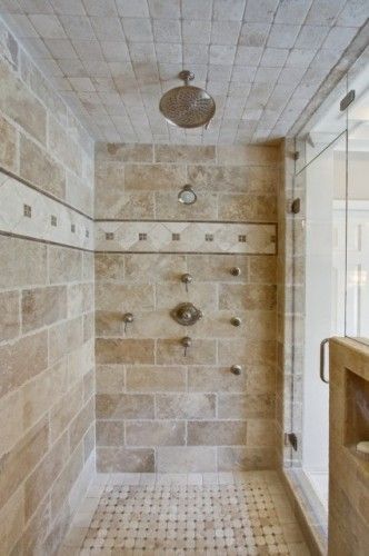 Interesting larger tile layout for a shower. Pair with a yellow-ish toned floor,