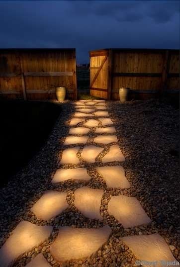 Line a pathway with rocks painted in glow in the dark paint. During the day they