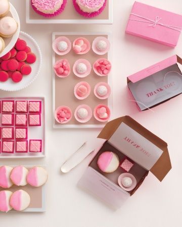 Line mini bakery boxes with vellum, and let guests mix and match confections to