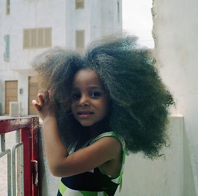 Little brown girl with halo of natural hair …  So cute ♥