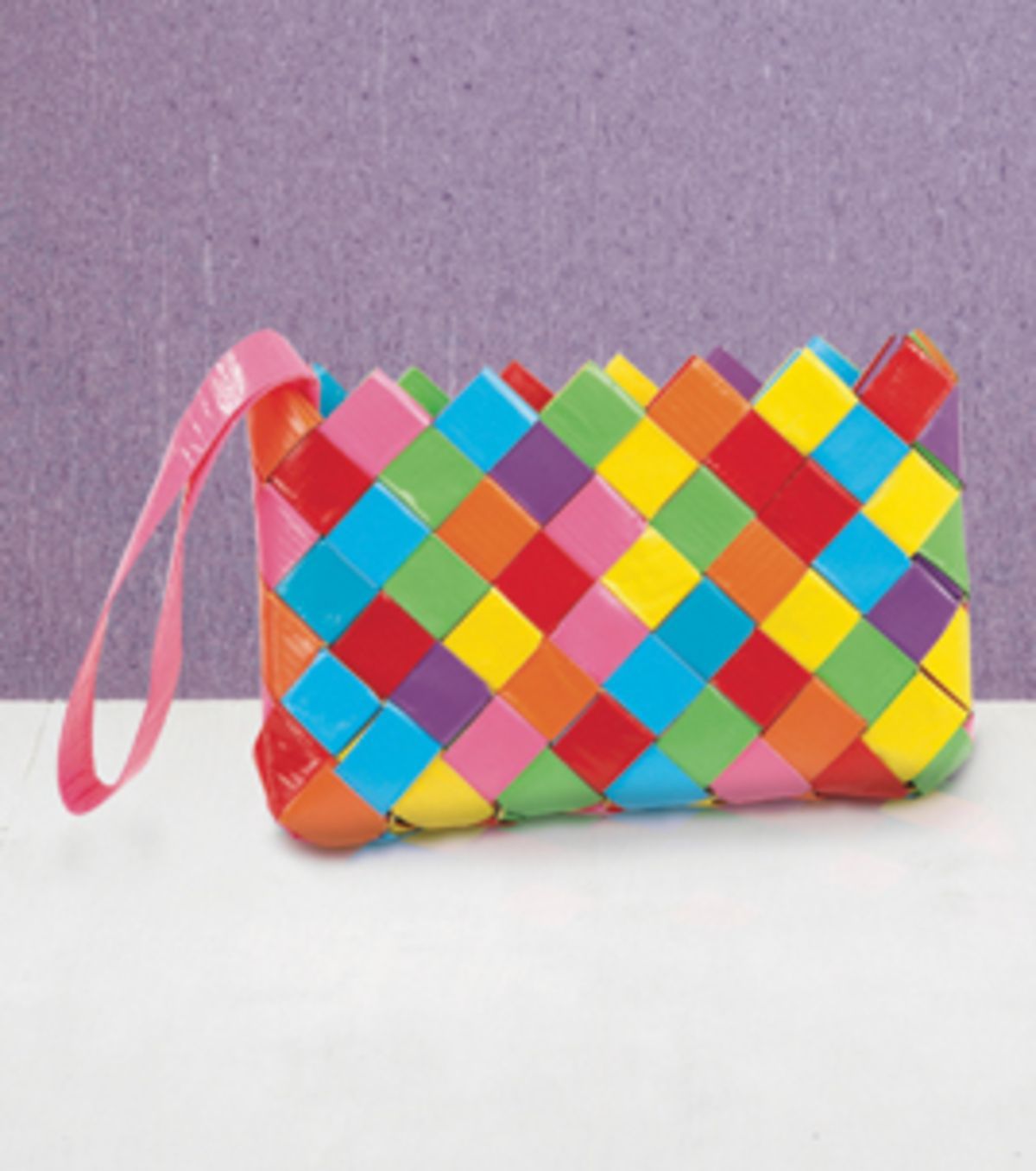 Love this! Chain-link duct tape clutch :)