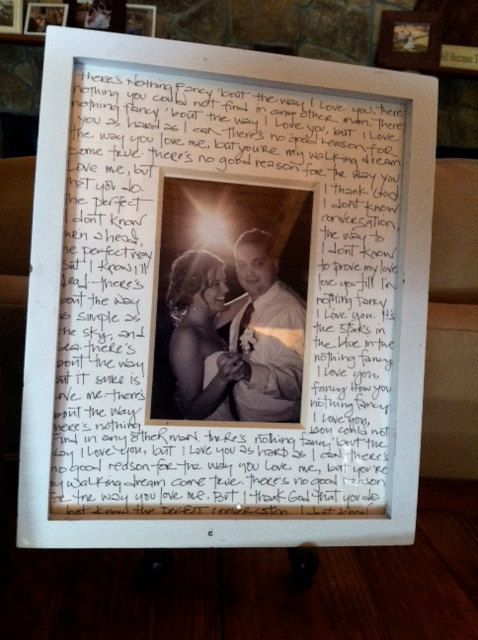 Lyrics of the first dance song surrounding a picture of the first dance!