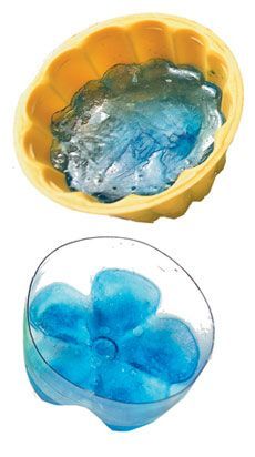 Make ice in the bottom of plastic bottles, looks like a flower…float in a bowl