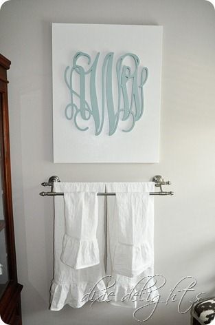Monogrammed DIY canvas – this site has a ton of ideas!  Over the bed?