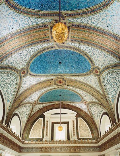 Original Tiffany mosaics sparkle over the arcades in Macy's (originally Mars