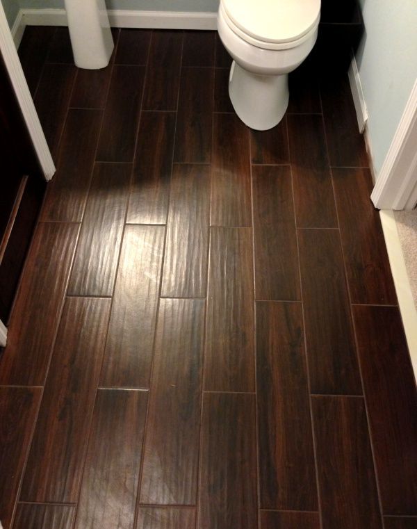 {This stuff is awesome} Tile that looks like wood. Wood-look tile. Bathroom floo