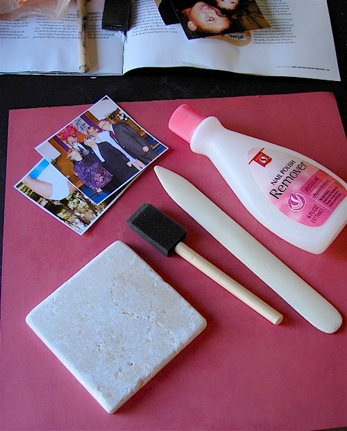 Transfer pictures to tiles by using Nail Polish Remover.