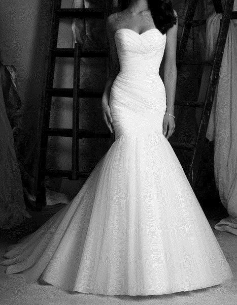 black and white photo of a simple mermaid wedding dress.
