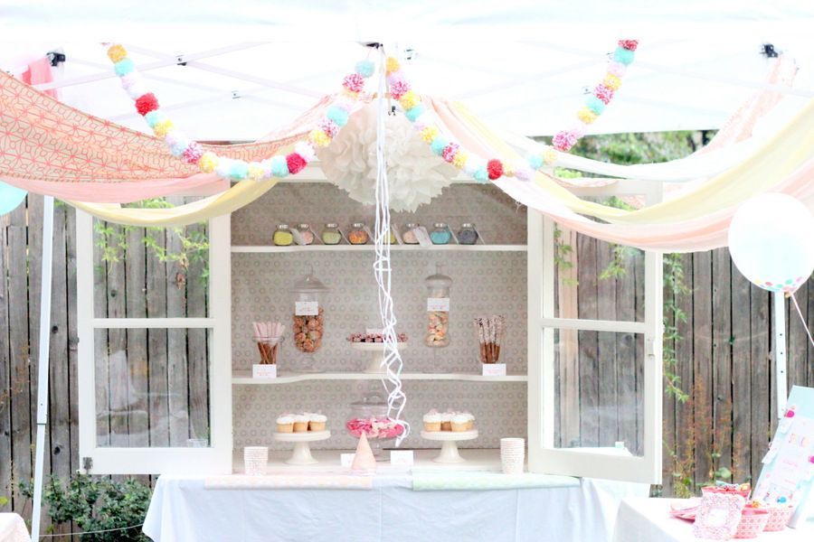 love this decor: pop-up tent canopy outside + hang large embroidery hoop in cent