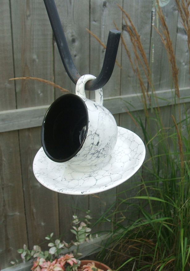 tea cups upcycled into bird feeders