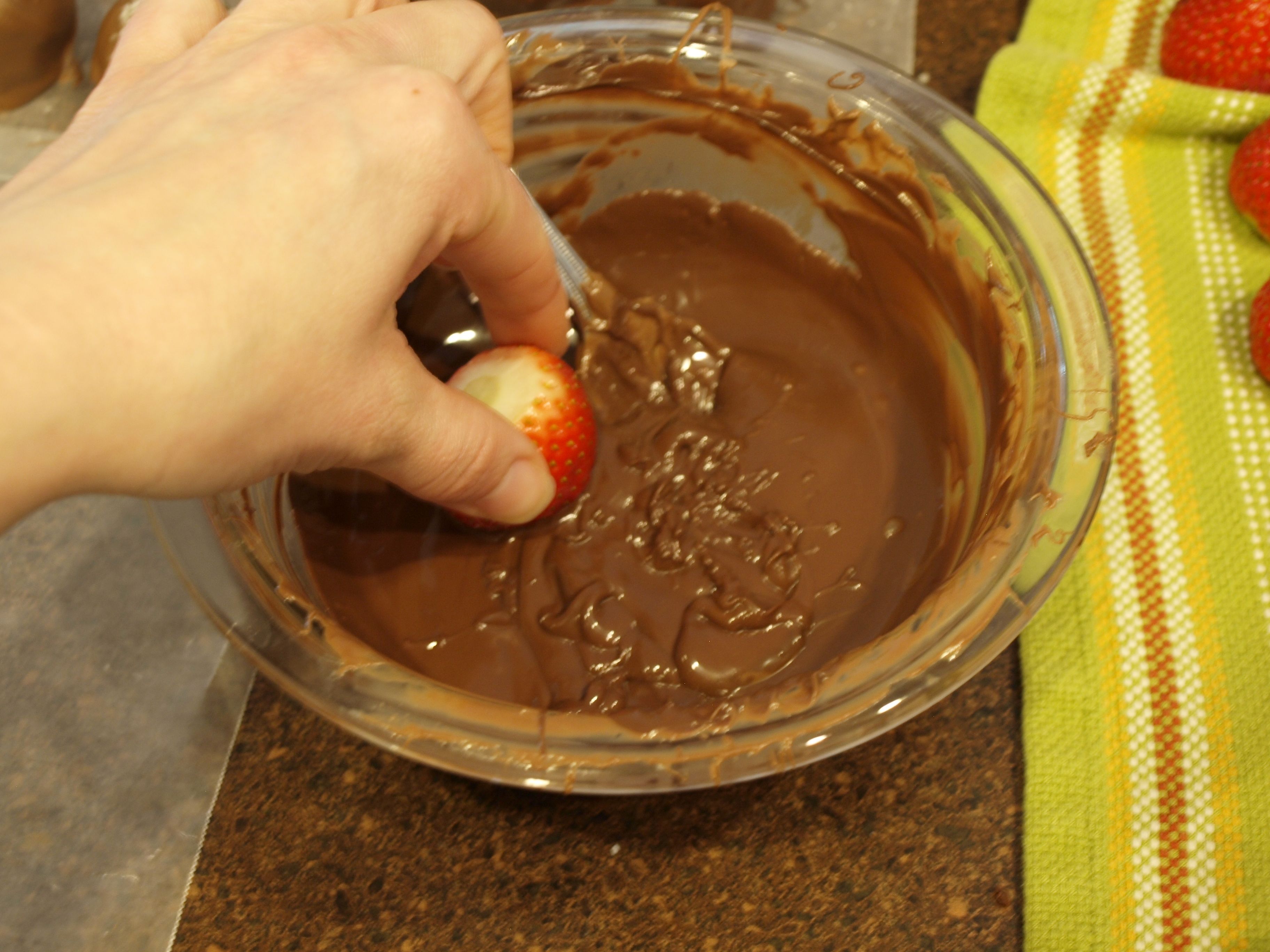 4. Dip half the strawberries in chocolate -   How to Create a Chocolate Tree