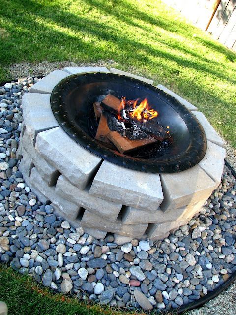 An inexpensive DIY firepit. This looks great!