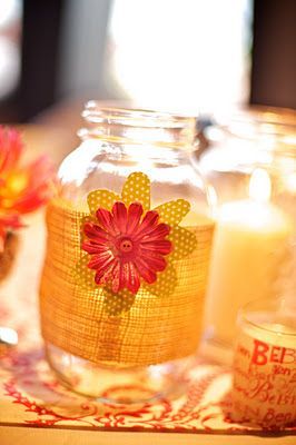 DIY Wedding decor. Burlap + scrapbook flowers + mason jars + candles = super cut