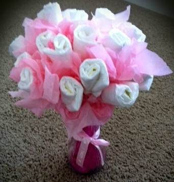 How to Make a Diaper Bouquet.  Cute, but I think I'd use onesies and socks i
