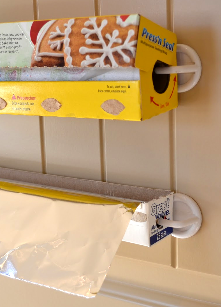 How to Organize Foil and Saran Wrap ~ using plastic hooks found at Walmart in th
