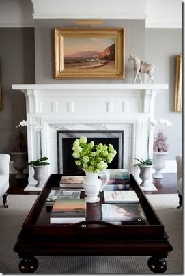 Love the gray walls with white trim that make this mantel pop.