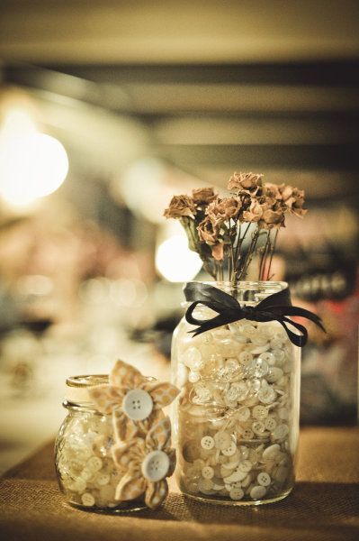 Mason jars with buttons for wedding center pieces