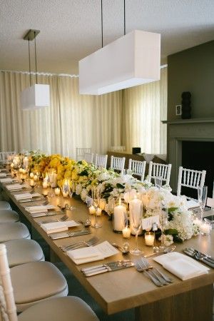 This estate table is so pretty with a  plush low-rise ombre centrepiece in white