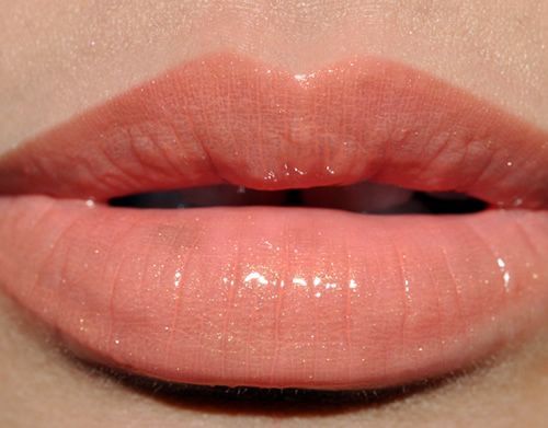 Wedding makeup: A subtle peach lipstick.