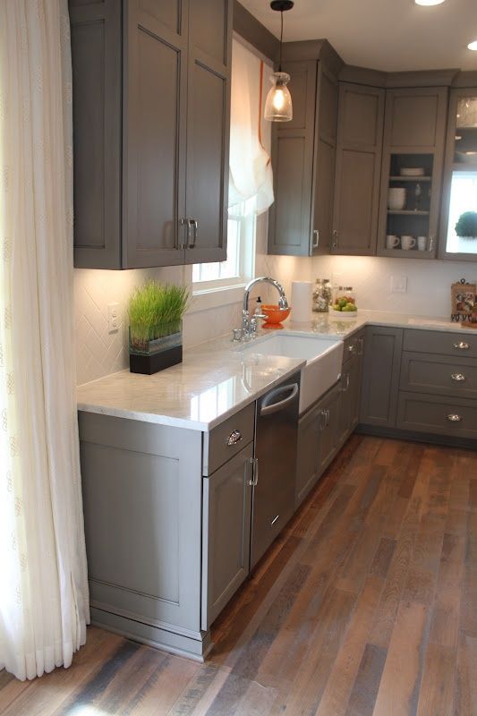 grey cabinets with white marble counters!
