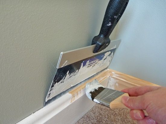 how to paint trim. a large spackle knife