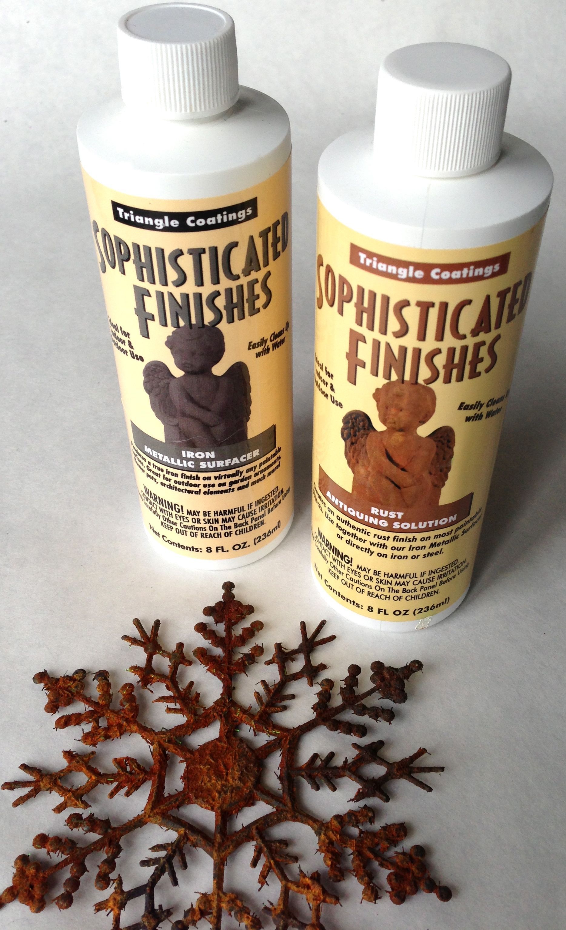 revamped $ store plastic snowflakes – check out these rusty looking fellas
