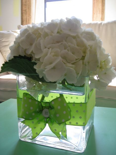 ribbon around a square vase for centerpieces
