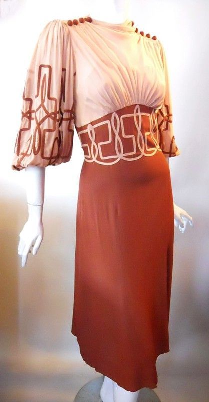 1930s silk crepe dress. Shirred shoulders and tops of sleeves. Button accents, s