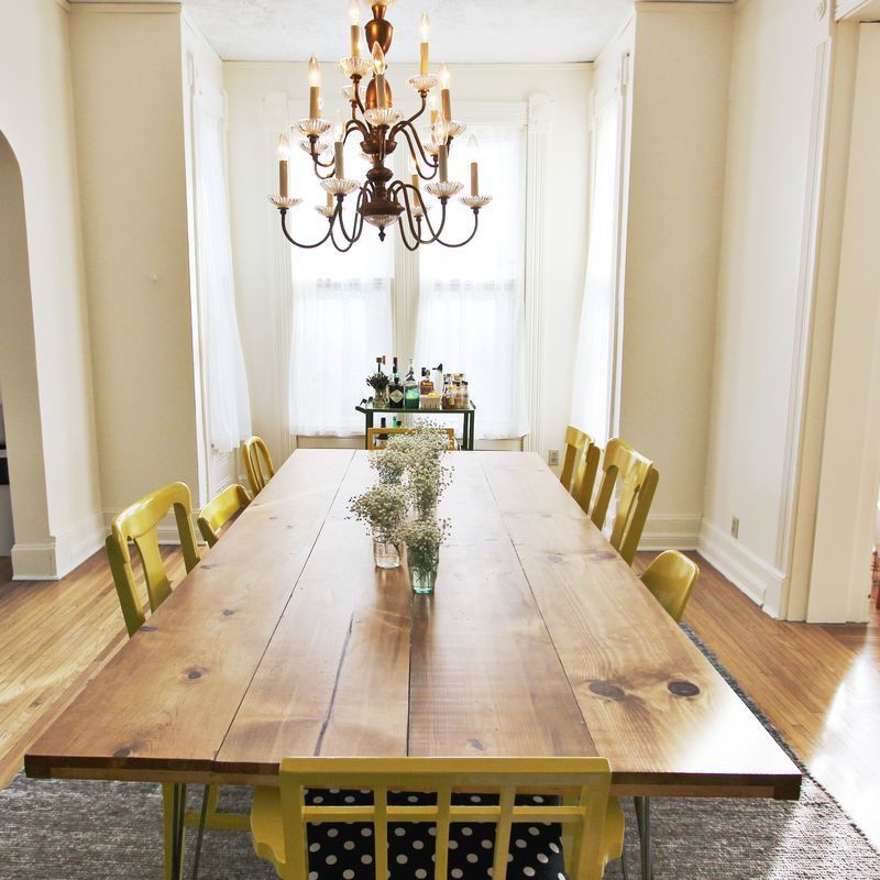 DIY Dining Room Table (by A Beautiful Mess). Love the mismatched chairs all pain