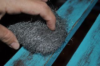 Distressing furniture. Using fine steel wool helps to distress paint but does no