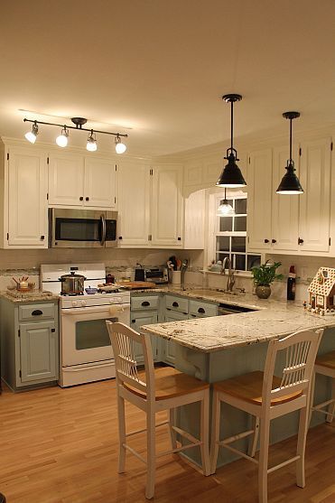Fresh new kitchen- great lighting and countertops!