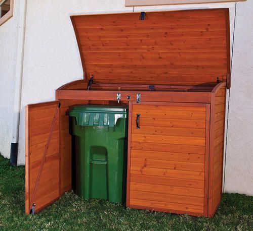 Garbage can shed so they are hidden, the smell is confined, and animals don'