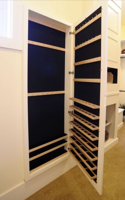 I like this built in jewelry storage.  Could go between the studs in the wall.