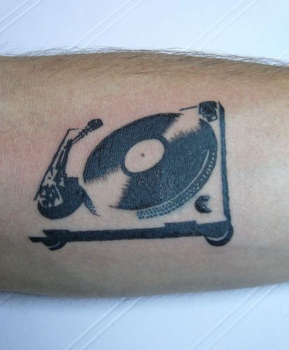 If I ever got a tattoo, it would be of just one small record, (no player). Becau