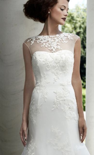 Isn't this wedding dress simply gorgeous? It can be worn with added illusion