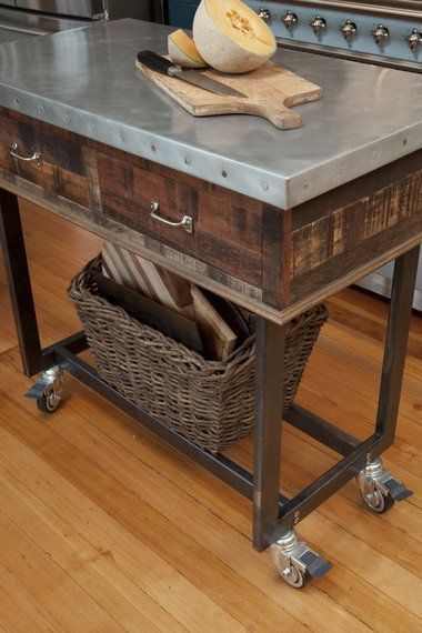 Kitchen island made of salvaged palette wood. Other items in the remodeled kitch