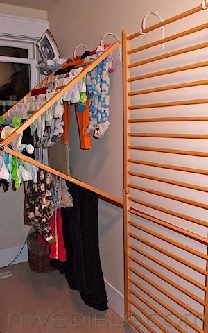 Recycle baby crib rails into a clothes drying rack…what a clever idea!