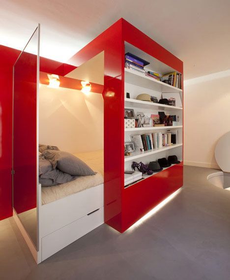 Red Nest: Glossy sliding wall unit combining a desk, bed and wardrobe. Super coo