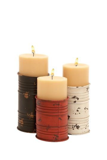 So simple and fun. Painted tin can candle holders.