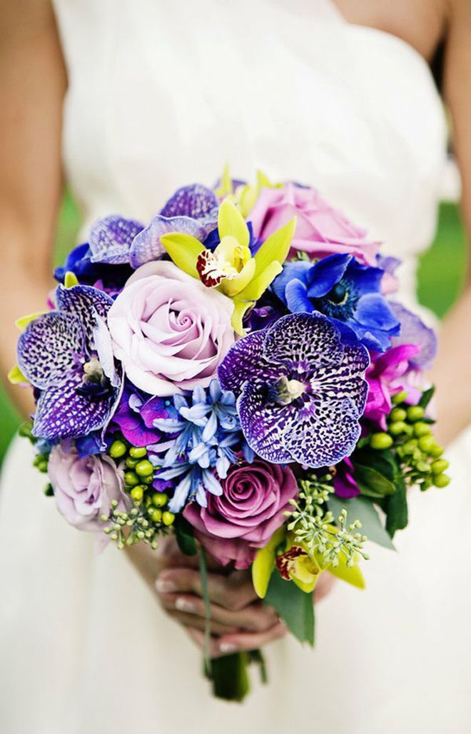 Toss-up on where to pin this unique bouquet … freckled vanda orchids, bright c