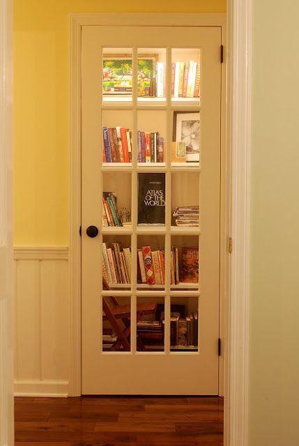 Turn a closet into a library and add a French door.
