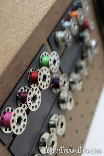 Use magnetic strips to hold bobbins!
