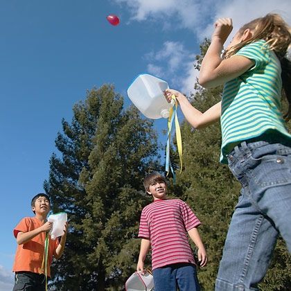 Water Balloon Catch- Create a catcher for each child by cutting the bottom off a