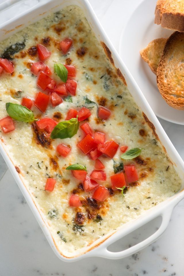 baked cheese dip with basil and tomato