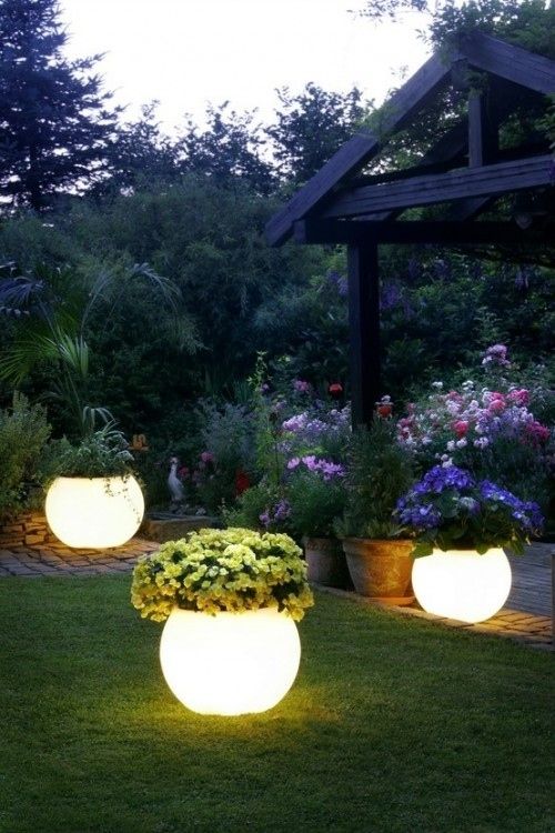 1. Coat planters with glow-in-the-dark paint for instant night lighting. -   32 Cheap And Easy Backyard Ideas